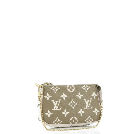 Pochette Accessoires Spring in the City Monogram Empreinte Leather Mini